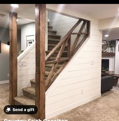 a living room filled with furniture and a stair case