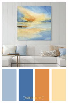 a living room with white walls and blue, orange, yellow and grey colors in it