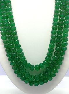 Name: Emerald Quartz Shape: Pumpkin Cut: Smooth Size: 8X10 MM - 9x12 MM (IN GRADUATION) Length: 16-20 Inch Quantity: 3 Strands (1 Necklace) Quality: AAA+ Jade Necklace With Spacer And Round Beads, Jade Necklace With Spacer Beads, Green Single Strand Beads And Cabochons As A Gift, Green Oval Beads For Jewelry Making, Green Beaded Necklace With Large Oval Beads, Jade Necklaces With Large Round Beads, Oval Jade Bead Necklace With Polished Finish, Jade Necklaces With Polished Oval Beads, Jade Necklace With Polished Oval Beads