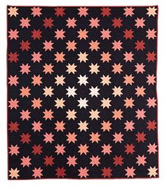 a black quilt with pink and red stars on the front, along with an orange border