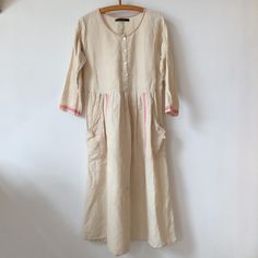 Such a very pretty vintage beige linen maxi dress from swedish brand, Gudrun Sjoden. Material:100% linen Size S Measurements: shoulder to shoulder:13,5" bust:18,5" length:44" Very good condition, but it has a repaired hole on the front, see on the last pic. Vintage Linen Dress For Spring, Spring Vintage Linen Dress, Fitted Cream Linen Dress, Casual Cream Linen Maxi Dress, Spring Cream Linen Maxi Dress, Spring Beige Linen Dress With Pockets, Vintage Linen Cream Dress, Vintage Cream Linen Dress, Cream Vintage Linen Dress