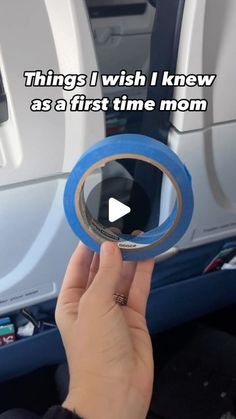 someone is holding their hand up to the glass in front of an airplane door that says, things i wish i knew as a first time mom