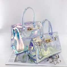 Laser PVC Handbag sold by ilovemybag. Shop more products from ilovemybag on Storenvy, the home of independent small businesses all over the world. Jelly Purse, Clear Handbags, Bag Transparent, Platinum Chain, Jelly Bag, Women Purse, Transparent Bag, Bag Trends, Casual Tote