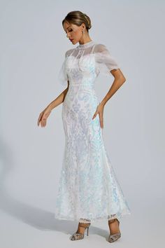 As a product expert, I am pleased to introduce the Selina Maxi Dress - perfect for any special event. This stunning dress features evening dresses, gala ballgowns, and a sparkling sequin design that will surely make you stand out. With its elegant and versatile design, it's the perfect choice for cocktail parties, graduation, and other formal occasions. Feel confident and stylish in this must-have dress. Material: Polyester Evening Ball Gown With Sequins And Fitted Bodice, Evening Sequined Mother Of The Bride Dress For Banquet, Sequin Mother Of The Bride Dress For Evening Banquet, Evening Banquet Mother Of The Bride Dress With Sequins, Sequined Maxi Length Evening Gown, Evening Maxi Gown With Sequins, Evening Dresses With Contrast Sequin And Tulle, Evening Tulle Dress With Contrast Sequin, Fitted Sequin Dress With Sweep Train For Gala