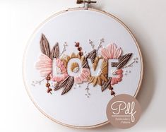 the embroidery pattern is in progress to make it look like love