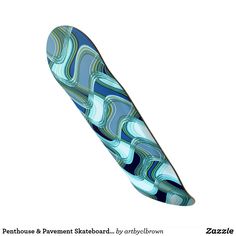 a surfboard with blue and green designs on it