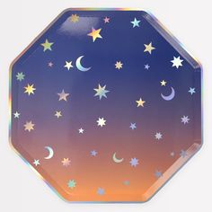 a paper plate with stars and moon designs on it