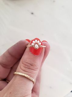 Dainty Handmade Midi Rings For Wedding, Dainty White Flower Ring For Promise, Dainty White Flower Promise Ring, Dainty Handmade Adjustable Pearl Ring, Dainty Opal Promise Ring, Delicate 14k Gold Filled Toe Ring, Handmade Dainty Pearl Open Ring, Dainty Handmade Pearl Open Ring, White Sterling Silver Dainty Midi Rings