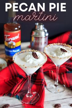 two glasses filled with ice cream and pecan pie martinis on top of a table