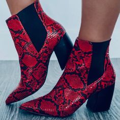 Red And Black Vegan Leather Ankle Bootie. Snake Print Pattern Throughout, Stretchy Elastic Black Side Panels, Pointed Toe, And An Approximate 2.5" Block Heel. New In Box. Red Party Booties For Fall, Trendy Boots With Red Sole For Fall, Red Round Toe Booties For Fall, Red High Heel Booties For Fall, Bold Ankle-high Boots For Fall, Red Ankle Booties For Winter, Red Winter Ankle Booties, Trendy Red Heels For Fall, Red High Ankle Heels For Fall