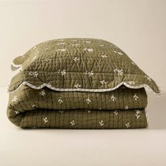 two pillows stacked on top of each other