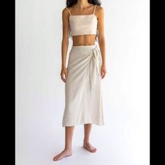 Beautiful Linen Blend Skirt With Elastic Back Waist, Tie, And Side Zipper. Has Lining That Almost Reaches The Knee. New With Tags. I Bought It On A Whim But Haven’t Worn It Because It’s A Little Long On Me. It Still Is An Okay Length On Me But I Wish It Was A Little Shorter And Fit Like It Does On The Model. Beige Wrap Skirt For Summer Day Out, Summer Beige Skirt For Brunch, Casual Wrap Skirt For Summer, White Tie Waist Skirt For Beach, Wrap Beach Skirt With Lining, Beach Wrap Skirt With Lining, Relaxed Wrap Skirt For Beach, Relaxed Fit Wrap Skirt For Beach, Fitted Beige Skirt For Beach Season