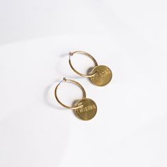 Details A simple brass hoop with a classic Twisted tag – earrings for everyday wear. Brass 2" Drop Very lightweight Everyday Cadmium-free Brass Earrings, Small Brass Hoop Earrings For Everyday, Brass Small Hoop Earrings For Everyday, Personalized Everyday Hoop Earrings, Personalized Round Hoop Earrings For Everyday, Cadmium-free Brass Hoop Earrings For Everyday, Everyday Brass Hoop Earrings With Ear Wire, Brass Hoops, Everyday Wear