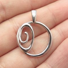 Great vintage condition.  S925 Sterling Silver Vintage Swirl Open Circle Pendant  Weight: 1.8g   WELCOME TO PAWN SHOP We are an actual pawn shop and have been in business for over 25 years. Since 1990, our establishment has been serving a variety of clients by providing them with short term cash solutions and options of liquidity regarding their treasured heirlooms. Acknowledging that today′s customers are very sophisticated and are looking for a variety of investments, our acquisitions are hand-picked for our special clientele. We do offer the most interesting items along with affordable prices. We do not disturb our vintage jewelry in order to keep its original patina leaving it to your discretion. Depending on your own taste, you can either polish it or keep it in the same condition. We Sterling Silver Swirl Jewelry In Silver, Sterling Silver Swirl Jewelry, Do Not Disturb, Funky Jewelry, Peridot Gemstone, Pawn Shop, Size 10 Rings, Circle Pendant, Hand Picked