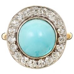 Natural untreated Persian blue Turquoise round cabochon ring circa 1930. Bright shiny high dome Turquoise surrounded by bright sparkly old European cut Diamonds in a handmade Platinum top on a 14k yellow gold ring. 1 round cabochon greenish blue Turquoise, 10.09 x 10.23 x 7.07mm, GIA certificate #6187748806 19 old European cut Diamonds, approx. total weight 1.00cts, G – H, VS1 – SI1 Size 7.75 and sizable 14k yellow gold & Platinum Tested: 14k & Platinum Width at top: 17.56mm Height at top: 9.63mm Width at Bottom: 1.86mm 5.9 grams Cocktail Ring Diamond, Persian Turquoise Ring, Expensive Rings, Antique Turquoise, Radiant Engagement Rings, Persian Turquoise, Vintage Cocktail Ring, Round Halo, Gold Cocktail Ring