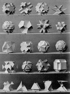 an old black and white photo with many different types of origami paper shapes