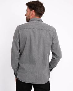 Amsterdam Heritage introduces the Flagler denim shirt for its menswear collection. Featuring a front pocket and snap button closure, the long-sleeved shirt is made from pure cotton, creating a lightweight and comfortable feel for the wearer. Adorned with our brand's logo, presented subtly in the back and side stitching, the Flagler is the ultimate classic denim shirt for every occasion. Never going out of style nor going out of season, style it with a blazer for a semi-casual look or match it wi Timeless Fashion Pieces, Scarf Jacket, Semi Casual, Denim Shirt Men, Jean Belts, Menswear Collection, Grey Denim, Mens Denim, Belted Dress