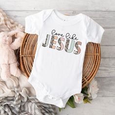 Christian Baby Onesie®, Love Like Jesus Shirt, Christian Baby Bodysuit, Christian Sweater, Toddler Jesus Shirts, Christian Baby Shower Gift HOW TO ORDER * Please review all the information provided before placing an order. 1. Select the style and size using the drop-down menu. 2. Select color 3. [APPLICABLE ONLY ON CERTAIN LISTINGS] Follow the instructions to fill out the "Add your personalization" option, e.g., specifying custom sayings or selecting design colors. 4. Select quantity Need more I Cotton Onesie For Baptism, Cute Cotton Onesie For Baptism, White Short Sleeve Onesie For First Birthday, White Short Sleeve Onesie For Baptism, Cotton Baptism Onesie With Short Sleeves, Casual White Onesie For First Birthday, Christian Baby Onesies, Christian Sweater, Christian Baby Shower