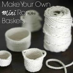 some white twine is sitting on a table next to two small cups and a pair of scissors