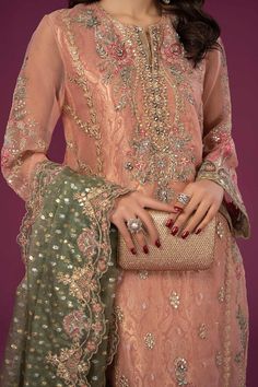 Peach Shade Embroidered Luxury Formal Maria B Pakistani Salwar Suit depicts floras in bloom to create a mesmerizing composition of elegance and sophistication. Delivery: 7 Business Days Detailed Description: SKU: PB680 Detailing: Embroidery, Threads Color: Peach Fabric: Net, Organza Design: Fully Embroidered dress Event: Festive, Party wear Luxury Peach Salwar Kameez For Festive Occasions, Peach Color Outfits, Luxury Bollywood Style Peach Salwar Kameez, Peach Colour Pakistani Suit, Peach Pakistani Suit, Festive Semi-stitched Peach Salwar Kameez, Peach Colour Combinations, Peach Color Dress, Combination Dresses