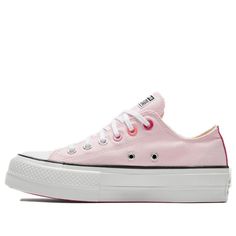 Looking for a cute and stylish way to celebrate Valentine's Day? Check out the Converse Women's WMNS Chuck Taylor All Star Lift Ox 'Valentine'! This festive sneaker features a pink canvas upper with black details for a fun and festive look. The platform midsole provides a lift, while the magenta flowers add a whimsical touch. Whether you're spending the day with your special someone or going out with friends, the Converse Women's WMNS Chuck Taylor All Star Lift Ox 'Valentine' is the perfect way Converse Womens, White Canvas Shoes, Magenta Flowers, Chuck Taylor All Star Lift, Converse Chuck Taylor All Star, Stylish Sneakers, Womens Converse, Chuck Taylor Sneakers, White Canvas