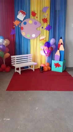 the room is decorated with balloons and decorations