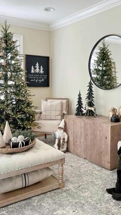 a living room filled with furniture and a christmas tree