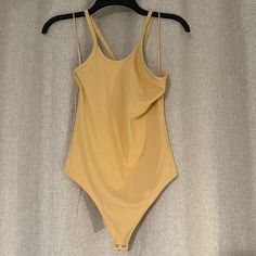 Small Nwt A&F Yellow Ribbed Body Suit Great Thick Material Tts Fitted Plain Bodysuit For Summer, Yellow Seamless Swimwear For Spring, Yellow Stretch Swimwear For Spring, Yellow Fitted Top For Loungewear, Yellow Fitted Bodysuit For Summer, Fitted Yellow Top For Loungewear, Yellow Casual Bodysuit For Spring, Casual Yellow Bodysuit For Spring, Fitted Yellow Bodysuit For Summer