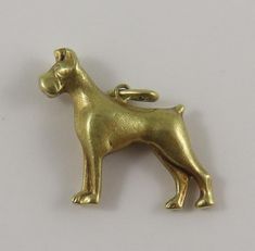 This is a vintage "Dog" 14 karat gold charm for a charm bracelet.  It weighs 1.10 grams and measures 1" x 7/8", marked "585" All charms come with a split ring to attach to a bracelet. We have hundreds of charms in stock. If you don't see what you are looking for in our shop please contact us as it is likely we have it. Inventory #G5459 Antique Gold Charms For Collectors, Antique 14k Gold Charms For Collectors, Antique Gold Hallmarked Charms, Collectible Hallmarked Yellow Gold Charms, Antique 14k Gold Hallmarked Charms, Antique Hallmarked 14k Gold Charms, Collectible Gold Charms, Gold Charms, Vintage Dog