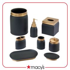 black and gold bathroom accessories including soap dispenser