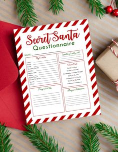 a printable secret santa questionnaire on top of a red envelope next to christmas decorations