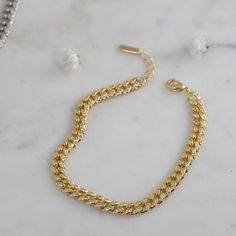 "Beautiful Curb Chain bracelet featuring pave cubic zirconia stones throughout the bracelet. Bracelet can also be worn on reverse side, where there are no stones. Very versatile and looks great worn alone or paired with other bracelets! - - - D E T A I L S - - - * Thick plating of 14k Gold or Rhodium over brass * Two Sizes Available 6.25\" or 6.75\" + .5\" Extension Chain * 6mm wide * Lobster Clasp Closure * Highest Grade CZ stones for an authentic diamond look Made with 100% Pure Love ♡♡ Comes Cubic Zirconia Jubilee Link Bracelet, Cubic Zirconia Curb Chain Bracelet Gift, Gift Curb Chain Bracelet With Cubic Zirconia, Cuban Link Anklet, Chain Link Bracelet Silver, Gold Chain Anklet, Curb Chain Bracelet, Gold Chain Bracelet, Chunky Earrings