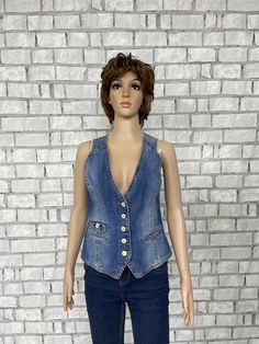 womens denim Vest Vintage BLUE denim Top BLUE jeans Top jeans Vest cotton Top womens Vest waistcoats Retro Vest jeans Vest cotton Vest XS 99%- Cotton; 1%-elastane height of the woman in the photo - 180 cm Please refer to photos for details of condition.  Condition: good vintage Measurements: Length: 57 cm/22.5" Bust: 84 cm/ 33" Waist: 76 cm/30" Size: XS note The color on the pictures may vary due to monitor settings and light reflections. Ready to ship Please do not hesitate to contact with me for any questions. Thank you for shopping today! Mens Tweed Vest, Check Vest, Blue Denim Top, Womens Black Vest, Womens Denim Vest, Top Jean, Tweed Vest, Winter Vest, Jean Vest