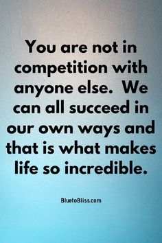 a blue wall with a quote on it that says, you are not in competition with anyone else we can all proceed in our own ways and that is what makes life so incredible