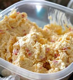 a plastic container filled with food on top of a table