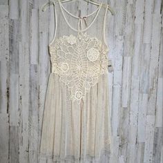 Free People Crochet Appliqué Mesh Dress M Boho Sheer Ivory Creme NWT Sheer Cream Lace Dress, Flowy Beige Dress With Lace Patchwork, Flowy Beige Dresses With Lace Patchwork, Sleeveless Beige Dress With Crochet Lace, Cream Flowy Dress With Lace Patchwork, Flowy Cream Dress With Lace Patchwork, Off White Lace Patchwork Summer Dress, Cream Dresses With Lace Patchwork Flowy Fit, Off White Lace Patchwork Dress For Summer