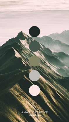 an image of mountains with circles above them