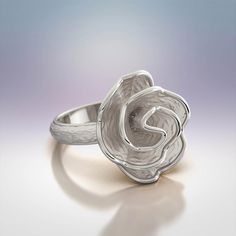 Elevate your jewelry collection with the exquisite beauty of our Rose Blossom Shaped Ring, meticulously crafted in Italy from your choice of 14k or 18k gold. This enchanting ring captures the delicate grace of a blooming rose, with its meticulously designed petals. The ring's distinctive allure lies in its juxtaposition of rough, textured surfaces that mimic the intricacies of nature, contrasted by polished edges that reflect light with a captivating brilliance. Experience the artistry of Italia Rose Blossom, Italian Jewelry, Blooming Rose, Ring Verlobung, Jewelry Collection, 18k Gold, Blossom, Ring Size, Fine Jewelry