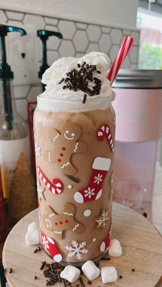 there is a drink with chocolate and marshmallows in it