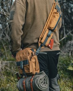 Bushcraft Shoulder Bag crafted from tough and water-resistant Kodura 600x300 D PVC canvas, lined with durable Oxford Polyester 600D, and featuring padded sides for extra protection. Bag dimensions: - Width - 20cm - High - 25cm - Deep - 10cm Case dimensions: Main Pocket Length - 40cm - 55cm Wide - 12cm Deep - 4cm One frontal and two inner pockets, and two side pockets with a water bottle option. The shoulder strap is removable and adjustable. The case is designed for Silky BigBoy 2000 and has an additional pocket for a small axe, but it will hold any similar-sized items in the saw pocket. The shoulder strap is removable and adjustable.  The Saw and the Axe are NOT included The Woodsman, Edc Bag, Protection Bag, The Saw, Mad Dog, Bushcraft, Comfortable Fashion, Outdoor Gear, Bulgaria