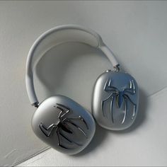 the headphones are designed to look like spider - man