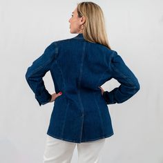 Discover the perfect blend of casual and polished with our chic structured denim blazer. Designed for the fashion-forward woman, this versatile denim jacket offers a sophisticated silhouette with notched lapels and a contemporary tailored fit. It's an ideal piece for those seeking a casual sophisticated denim blazer that transitions effortlessly from day to night. Denim Notch Lapel Outerwear With Button Closure, Classic Medium Wash Blazer With Button Closure, Denim Outerwear With Notch Lapel And Button Closure, Classic Long Sleeve Denim Jacket With Double Button Closure, Classic Denim Button-up Blazer, Classic Denim Blue Blazer For Spring, Classic Denim Blue Spring Blazer, Medium Wash Workwear Blazer With Pockets, Medium Wash Blazer With Pockets For Work