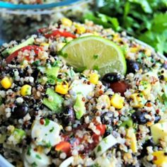 a salad with black beans, corn and avocado is shown in a bowl