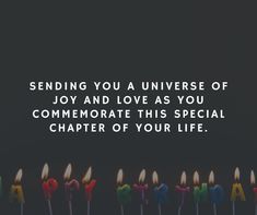 candles with the words sending you a universe of joy and love as you celebrate this special charter of your life