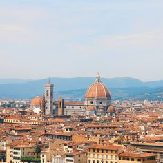 an aerial view of the city and its rooftops