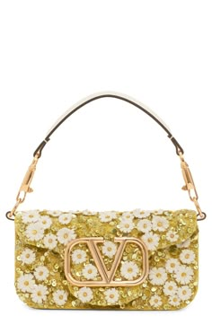 Destined to become Valentino's 'It' bag of the season, this adaptable bag is crafted from lambskin leather and embellished with beads and blooming daisies. A top handle and pull-through chain strap—both detachable—offer carrying options for the covetable look. Magnetic-snap flap closure Removable top carry handle; removable pull-through chain strap Interior wall pocket Leather Made in Italy Designer Handbags Dior Her, Celebrity Handbags, Painted Purse, Valentino Bag, Yellow Purses, Colorful Outfit, Paint Inspo, Embellished Bags, Flower Bag