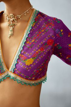 The dil kusha anam blouse is a stylish addition to any wardrobe. Crafted in jeni silk slub and decorated with embroidered border, this purple blouse brings a bold and feminine touch to the sari. Blouses Pattern, Blouse Necklines, Patterns Flowers, Lehenga Designs Simple, Kids Dress Wear, Embroidered Border, Unique Blouse, Sari Blouse, Trendy Blouses