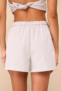 Prepare to make a stylish impression whenever you don the Lulus Posh Certainty Beige Pinstripe Linen Pleated High-Rise Shorts! A pinstriped design accents lightweight, linen-cotton blend woven fabric as it shapes these chic shorts with an elasticized high-rise silhouette, belt loops at the front, and a top button closure with a hidden zip-fly. Pleated accents and side seam pockets complete the tailored silhouette. Pair with the matching top for a complete look! Fit: This garment fits true to siz Chic Shorts, Spring Break Outfit, Pleated Shorts, High Rise Shorts, Matching Top, Women's Summer Fashion, Woven Fabric, Elastic Waist, High Rise