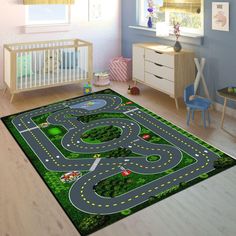 a child's room with a toy road rug on the floor