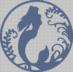 a blue and white cross stitch pattern with the silhouette of a mermaid in a circle